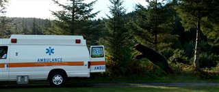 COCAINE BEAR Movie Clip - Cocaine Bear chases down an ambulance